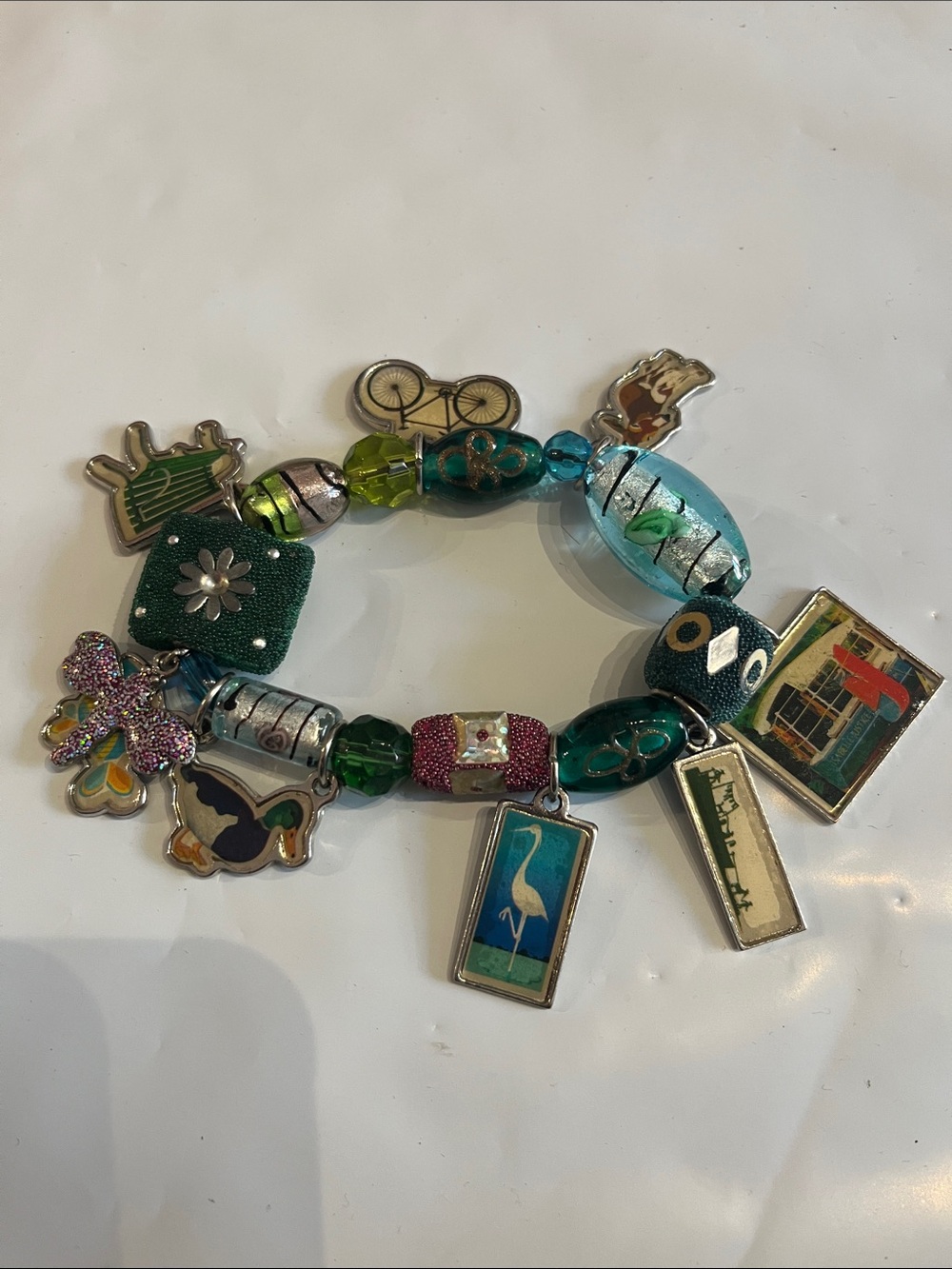 CHARM BRACELET, glass beads and novel charms hanging, stretch